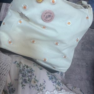 Helen added a photo of their purchase