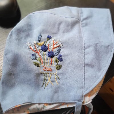 Floral Hand embroidered pink lune bag