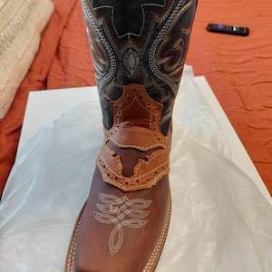 Sheila added a photo of their purchase