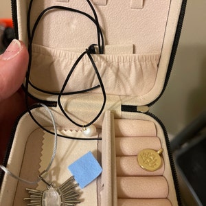 Sheli added a photo of their purchase