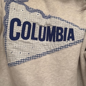 Daniella added a photo of their purchase