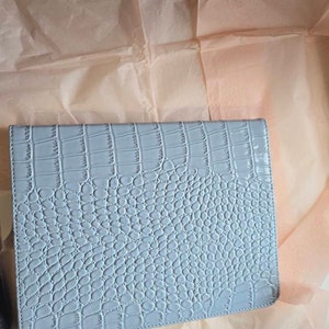 Michelle added a photo of their purchase