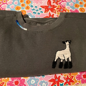 Tabetha added a photo of their purchase