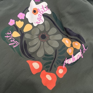 Naima added a photo of their purchase