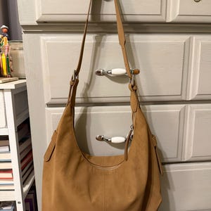 Sandy added a photo of their purchase