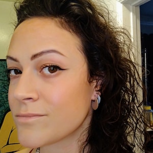 Adrienne added a photo of their purchase