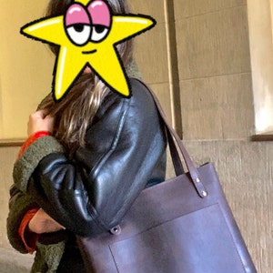 Özlem added a photo of their purchase
