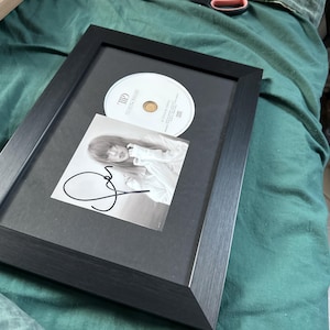 Olivia added a photo of their purchase