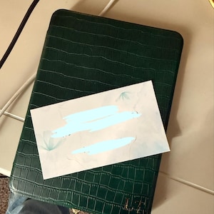 Mariah added a photo of their purchase