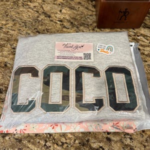 Sam added a photo of their purchase