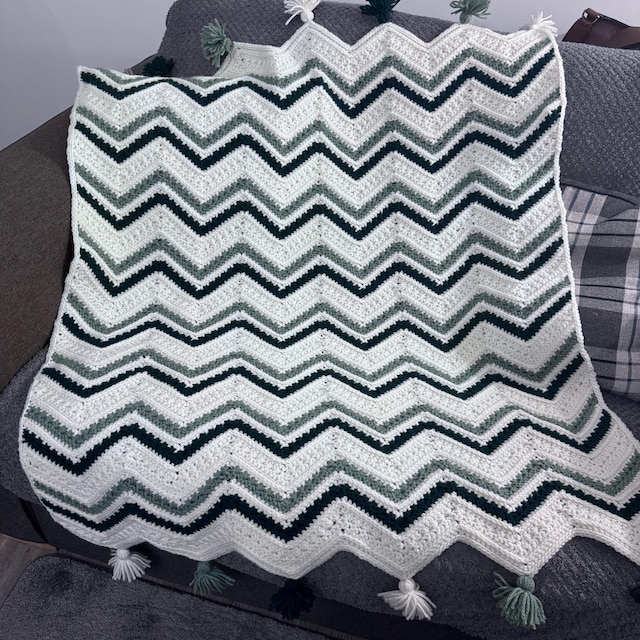 A customer's finished Petal Loop Chevron Blanket Crochet Pattern + Video