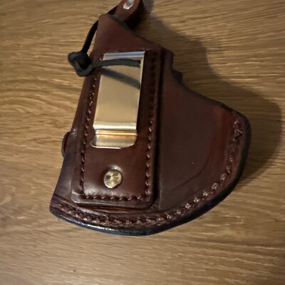 Cowboy style holster for North American Arms revolver with 2.5 inch barrel..sher