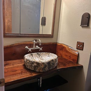 Denise added a photo of their purchase