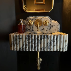 Kristina added a photo of their purchase