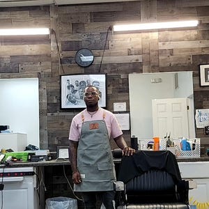 Momoh heeft een foto van de aankoop toegevoegd