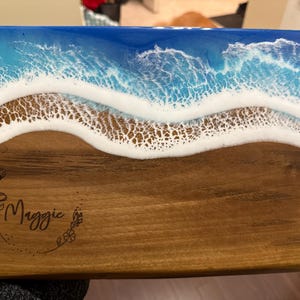 Laura added a photo of their purchase