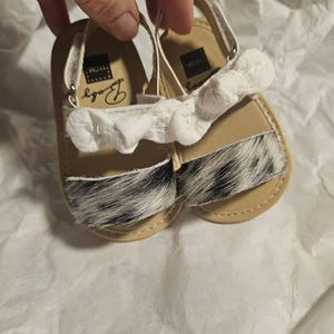 Sharon added a photo of their purchase