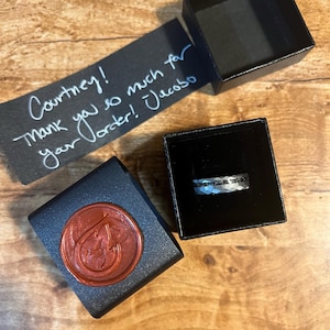 Courtney added a photo of their purchase