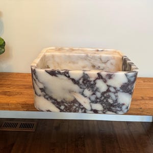 Grace added a photo of their purchase