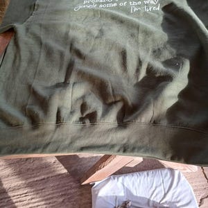 Sharon added a photo of their purchase