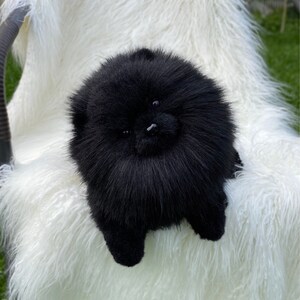 black pomeranian stuffed animal