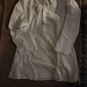 Angela added a photo of their purchase
