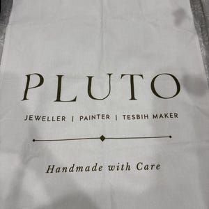 Pluto added a photo of their purchase