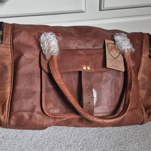 Elaine added a photo of their purchase