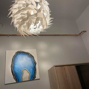 Noemi added a photo of their purchase