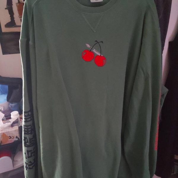 the EMERALD CITY crewneck sweater