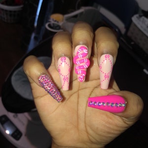 Aaliya Spearmon added a photo of their purchase