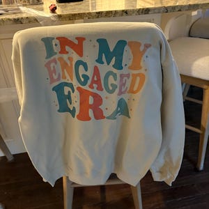 Marjorie added a photo of their purchase