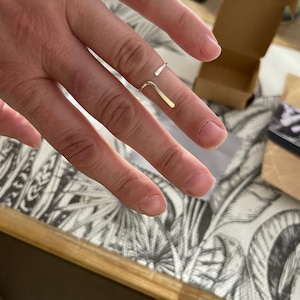 Nadège added a photo of their purchase