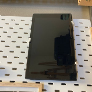 Lisa added a photo of their purchase