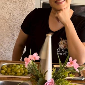 Adriana added a photo of their purchase