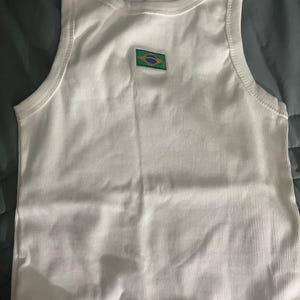Beatriz added a photo of their purchase
