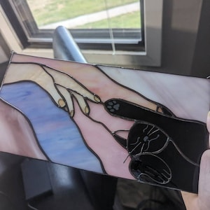 Sarah added a photo of their purchase