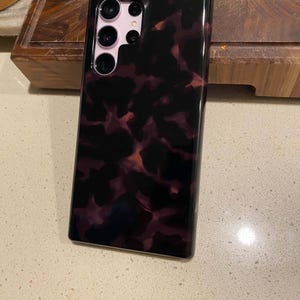 Liz added a photo of their purchase