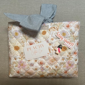 Larisa added a photo of their purchase