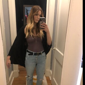 Kayla added a photo of their purchase