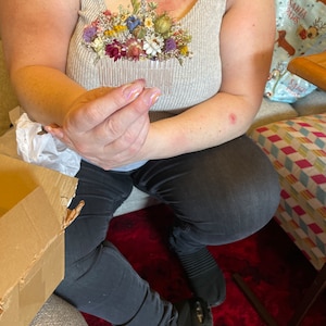 Sue added a photo of their purchase
