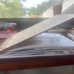 Madeline added a photo of their purchase