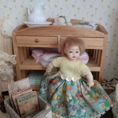 Dolls House 1.12th Baby/toddler Doll Comprising Of: Knitted Cardigan ...