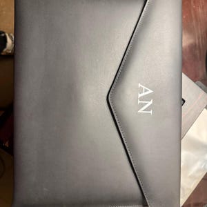 Nayla added a photo of their purchase