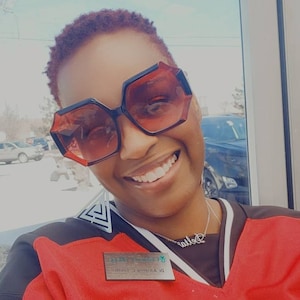 Adrienne added a photo of their purchase