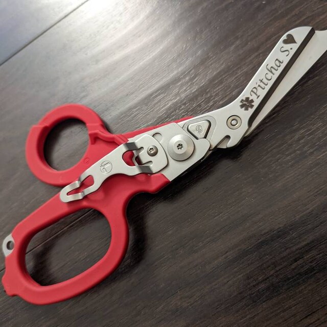 Custom leatherman raptor discount