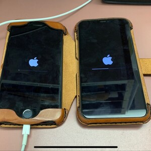 holds two phone dual phone case for 2 iphones