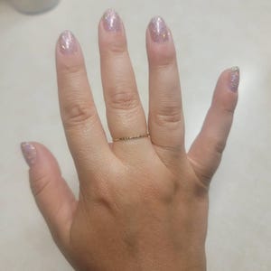 Kayla added a photo of their purchase
