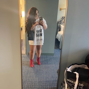 Aly added a photo of their purchase