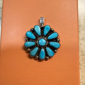 Mena added a photo of their purchase